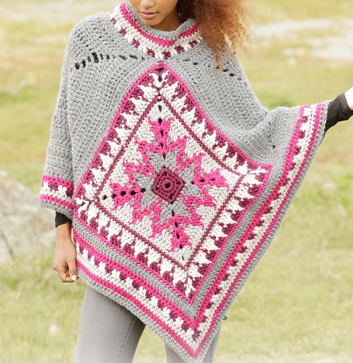 Poncho with multi-coloured pattern